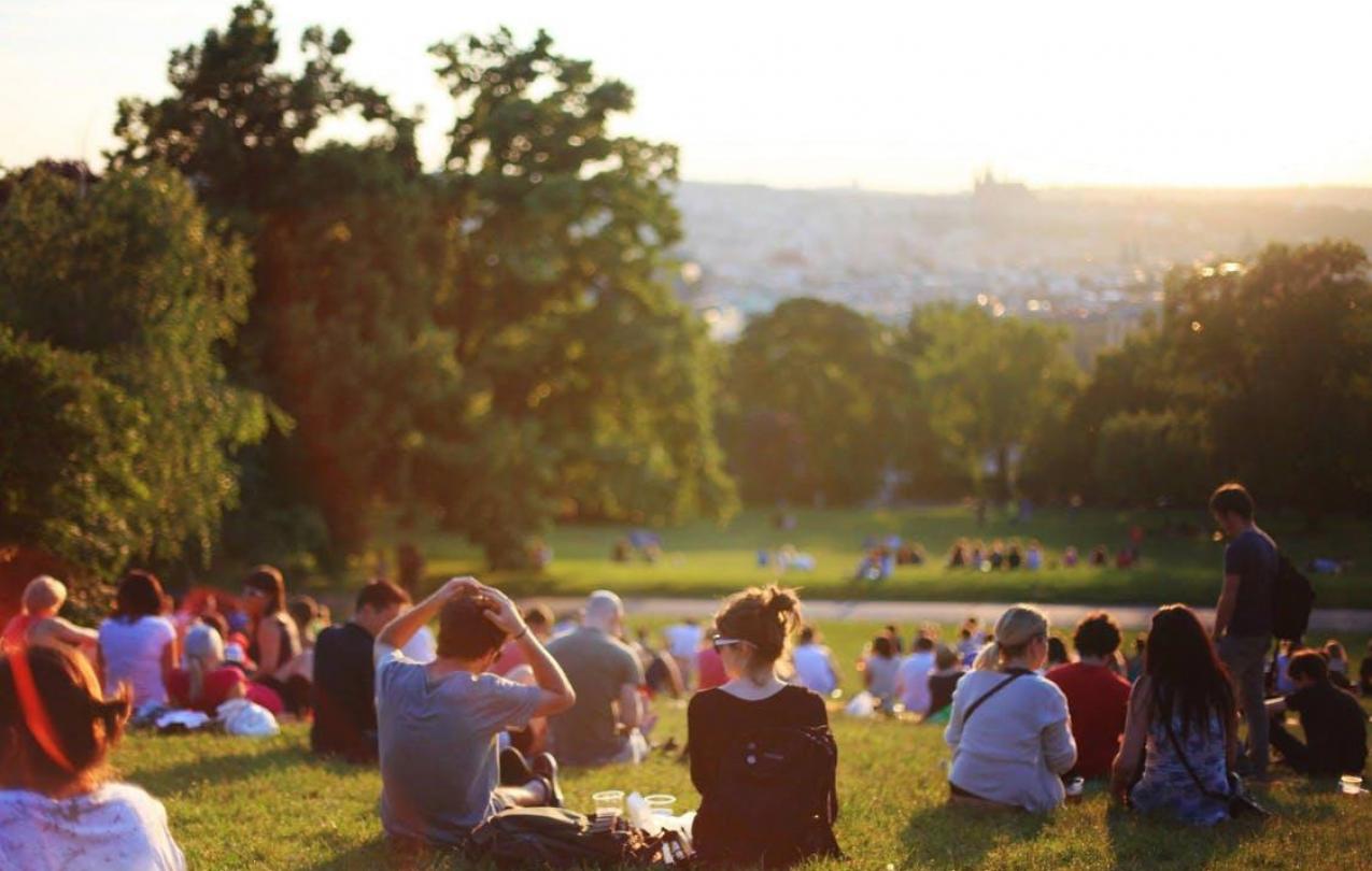 People sitting at a beautiful park, to indicate a fun event, CC0 pexels.com