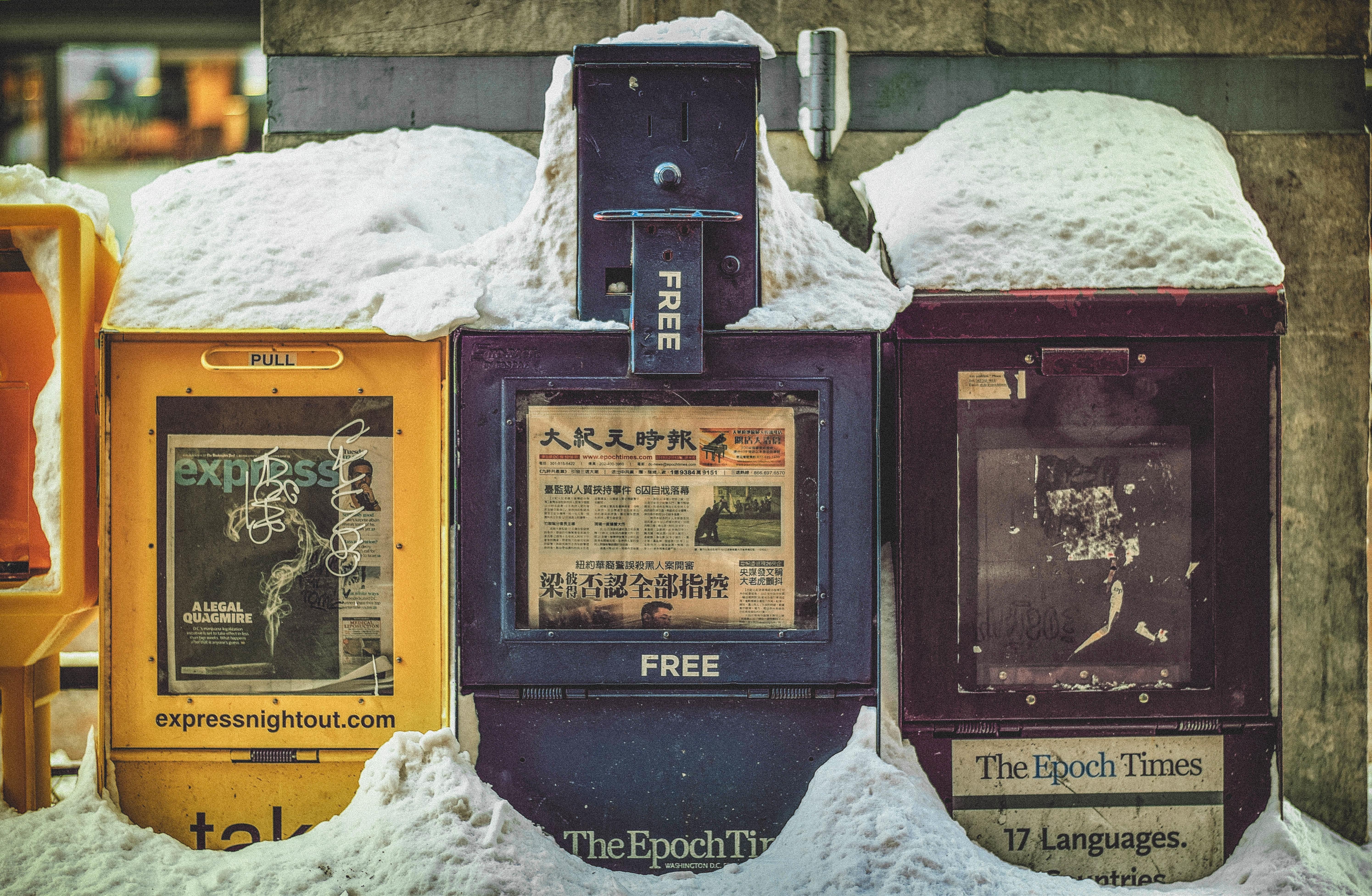 Snow covered newspaper vending machines to indicate news, CC0 from stocksnap.io